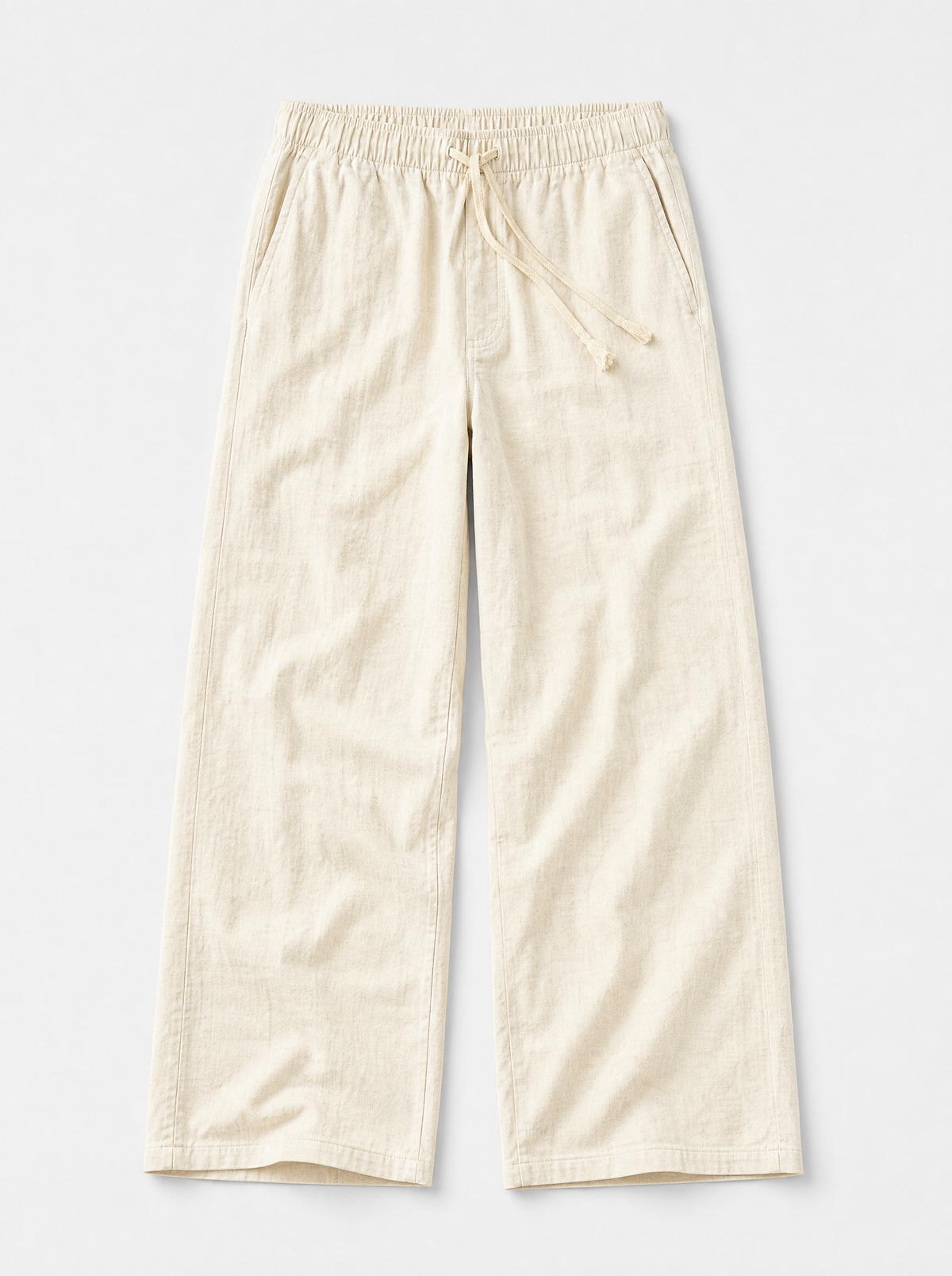 The Procida Pant — ivory cotton-hemp wide-leg drawstring beach pant, front view