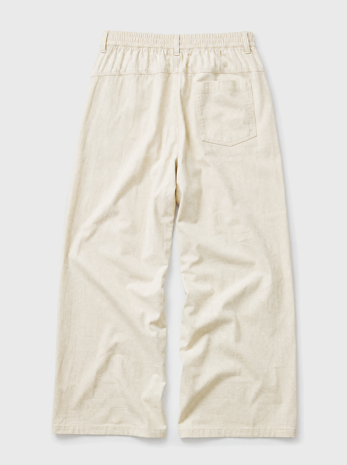 The Procida Pant — ivory cotton-hemp wide-leg drawstring beach pant, back view