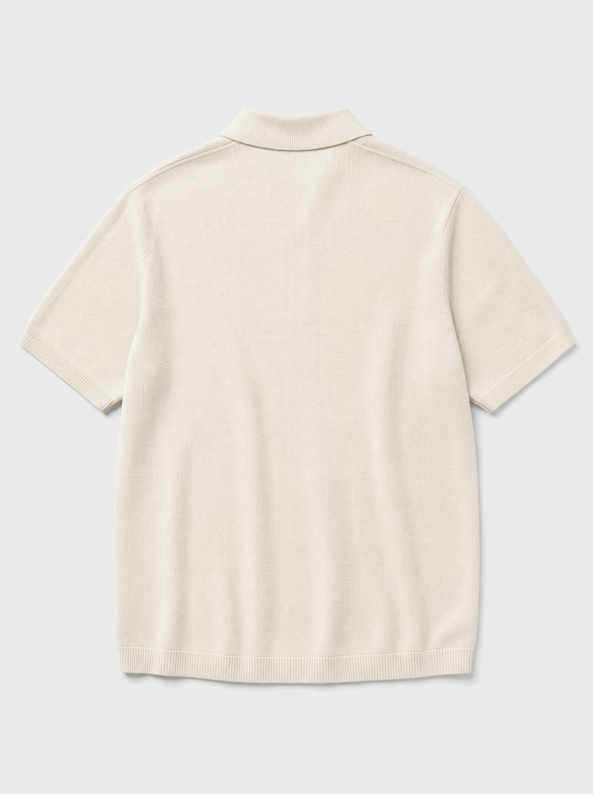 The Portofino Polo — ivory fine-gauge knit cotton short-sleeve henley polo, back view