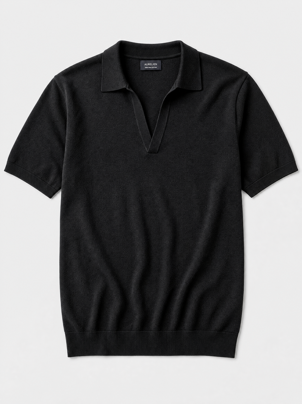 The Portofino Polo — black fine-gauge knit cotton short-sleeve henley polo, front view
