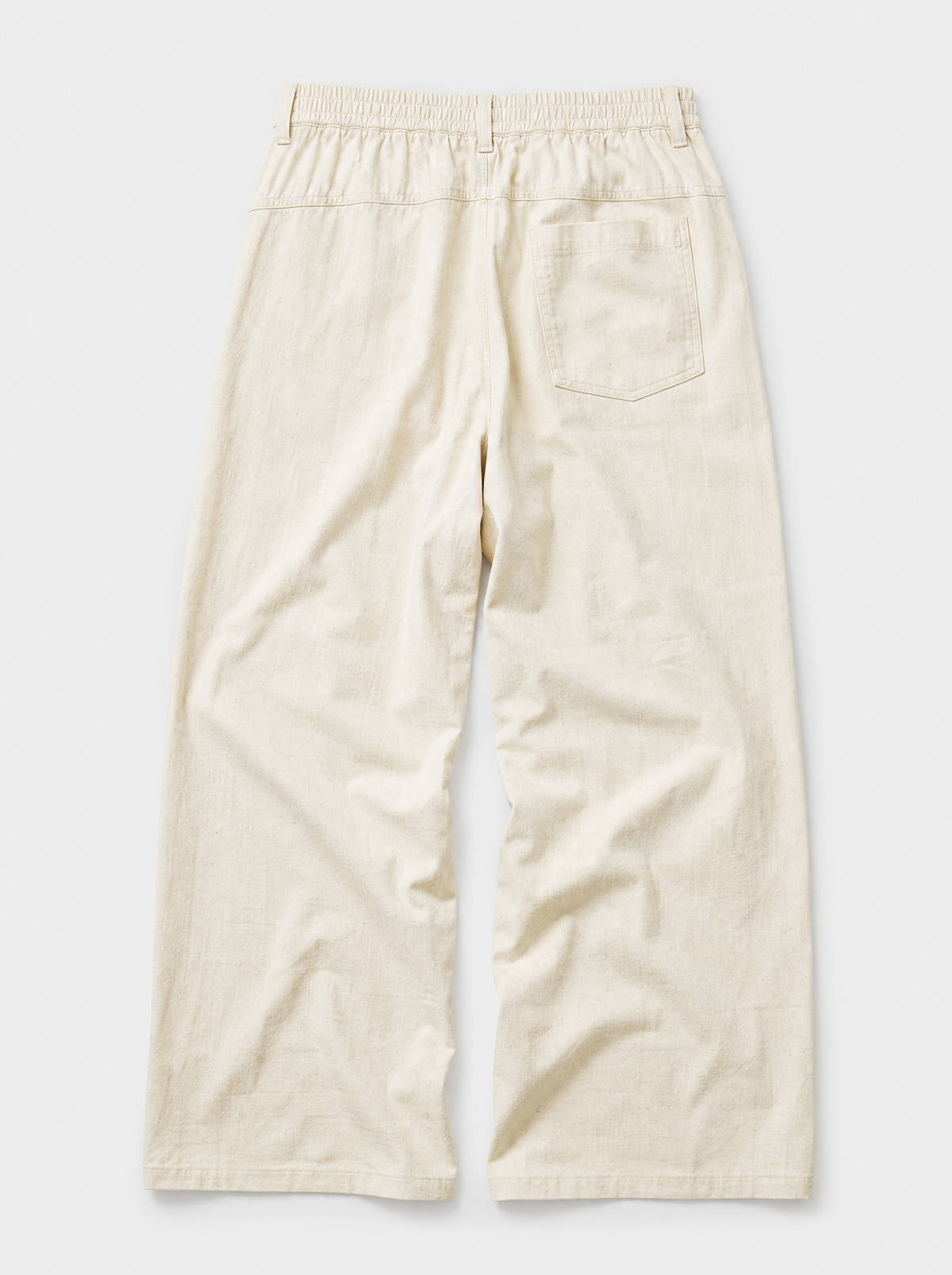 The Procida Pant — ivory cotton-hemp wide-leg drawstring beach pant, back view