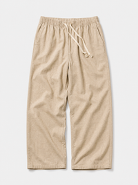 The Procida Pant — sand cotton-hemp wide-leg drawstring beach pant, front view