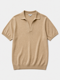 The Portofino Polo — sand fine-gauge knit cotton short-sleeve henley polo, front view