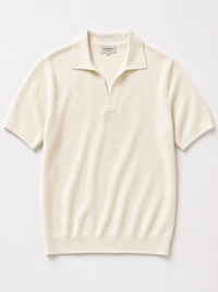The Portofino Polo — ivory fine-gauge knit cotton short-sleeve henley polo, front view