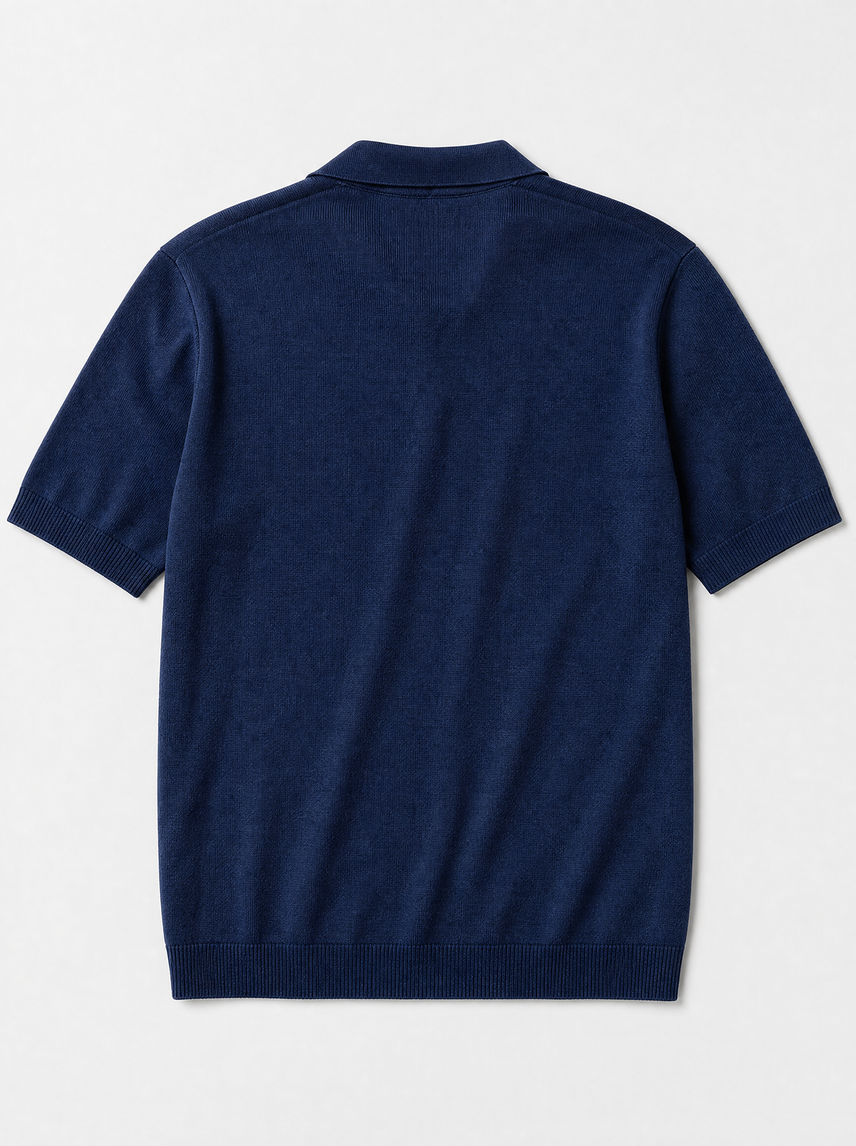 The Portofino Polo — navy fine-gauge knit cotton short-sleeve henley polo, back view