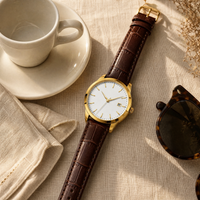 The Saint Veloir Timepiece styled with espresso and tortoise sunglasses
