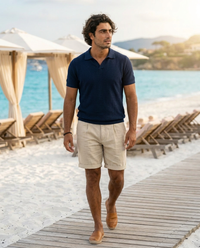 The Hydra Short - Sand on model, walking at beach club